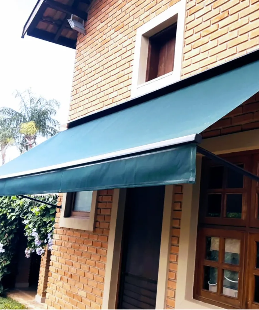 Fachada com toldo Marselha verde