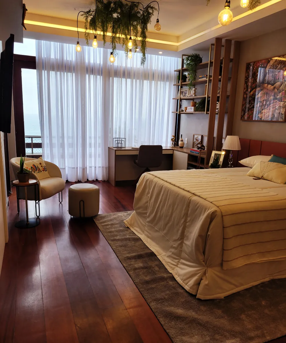 Suíte com cortinas leves do piso ao teto
